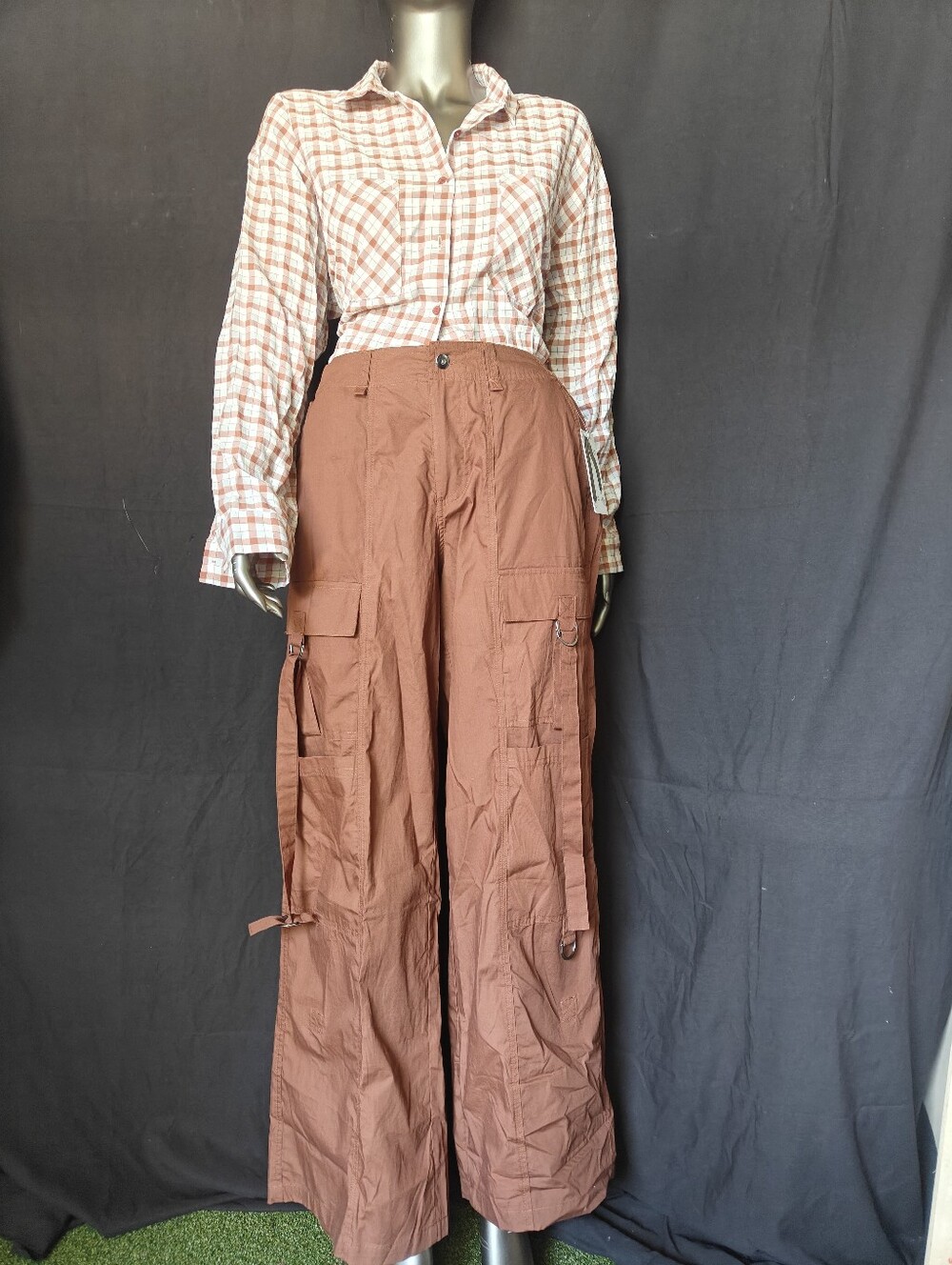 Brown Hunter plaid shirt with cargo pants.